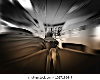 Brighton UK, Feb 16 2018: Man In Hooded Top Sit Waiting To See His GP Doctor At An NHS Doctor Surgery: Pinhole Motion Effect