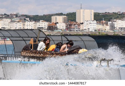 Brighton, UK. July 6 2019. Visitors Enjoying  The Log Flume Ride In The Amusement Park Part Of Brighton's Famous 