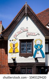 BRIGHTON, UK - JUN 5, 2013:  Mock Tudor Extravagant King And Queen Pub And Hotel Facade Portrays King Henry VIII And Queen Anne Boleyn