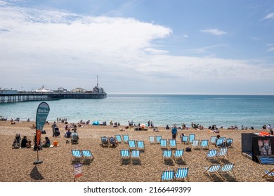 Brighton, UK - June 3 2022: Brighton Beach Seafront And Deck Chairs, East Sussex 