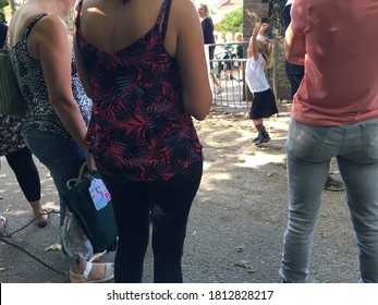 Brighton UK - September 10 2020 Parents Waiting In Front Of School Gate To Pick Up Their Kids