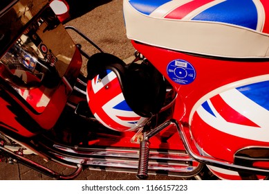 Brighton, United Kingdom - August 25, 2018: Side Detail Of Mod Culture Scooter With Union Jack Artwork And Helmet