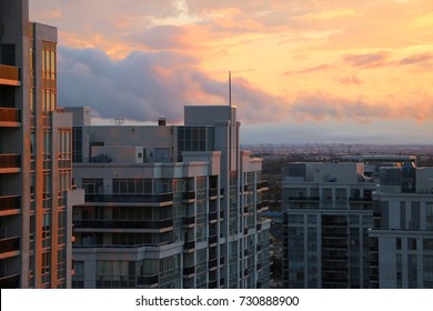 Brilliant Colorful Sunset Over Condo Buildings With Cityscape In The Background In Vaughan Ontario Canada