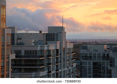Brilliant Colorful Sunset Over Condo Buildings With Cityscape In The Background In Vaughan Ontario Canada