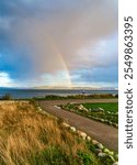 Brilliant rainbow over the water in Ruston, Washington.