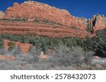 Brilliant seasonal vista on red rock formations from the Jim Thompson Trail Head in rural West Sedona, northern Arizona.