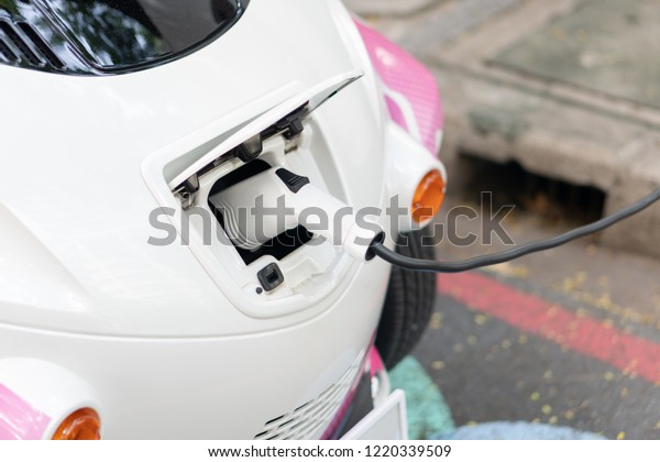 Bring Battery\
Chargers Connect with electric car To put the electric car into the\
car. Clean energy does not pollute the air. Energy conservation\
concept Alternative\
energy