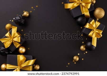 Bring joy to your nearest and dearest with holiday gifts. Top view shot of present boxes with golden ribbons, xmas balls, stars confetti on black background with advert zone
