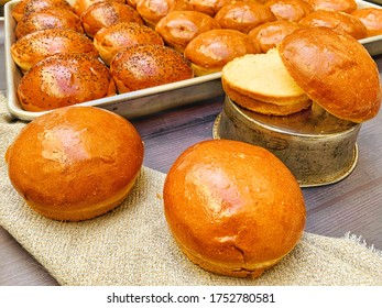 Brioche Burger Bun With Tray On A Wooden Table