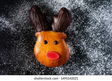 brioche deer with red nose and chocolate horns, Christmas bake Arkivfotografi