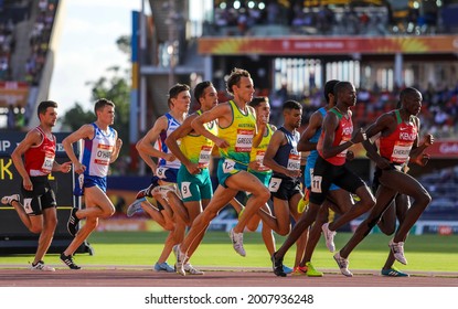 BRISBANE, AUSTRALIA - APRIL 14, 2018: Athletes compete in the Men's 1500 metres final during athletics of the Gold Coast 2018 Commonwealth Games at Carrara Stadium.