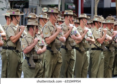 BRISBANE, AUSTRALIA - APRIL 25, 2017: Australian Army Soldiers Stand To Attention At The ANZAC Parade.