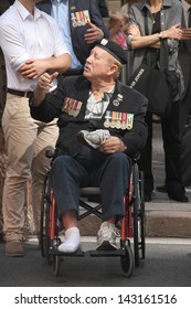 BRISBANE, AUSTRALIA - APRIL 25 : Veteran In Wheelchair At End Of Anzac Day Commemorations  April 25, 2013 In Brisbane, Australia