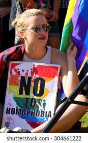 BRISBANE, AUSTRALIA - AUGUST 8 2015: Unidentified Rally Goer With Anti Homophobia Sign At Marriage Equality