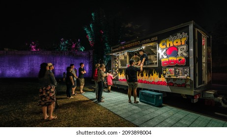 Brisbane, Australia - Dec 14, 2021: Outdoor Food Truck Serving Customers