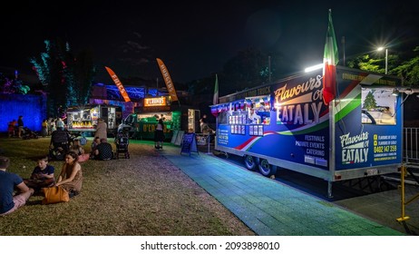 Brisbane, Australia - Dec 14, 2021: Outdoor Food Trucks Serving Customers