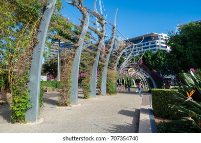 Brisbane, Australia - July 9, 2017: The Arbour is a pedestrian walkway running the length of the Brisbane South Bank parklands. The structure is covered in bougainvillea.