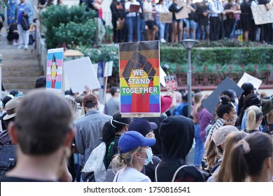 Brisbane, Australia - June 06, 2020: Black Lives Matter protest taking place in solidarity with the USA protests against police brutality and the police murder of George Floyd in Minneapolis.