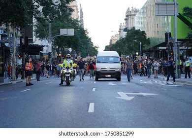 Brisbane, Australia - June 06, 2020: Thousands Of People Gather In City Streets Against Police Brutality And The Senseless Murder Of George Floyd By Minneapolis Police Department. 