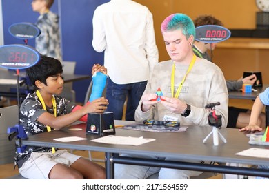 Brisbane, Australia - JUNE 25 2022: Brisbane's 20 In 21 In 2022 Speedcubing Competition, Competitor Solving Pyraminx Event, First Round.