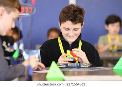 Brisbane, Australia - JUNE 25 2022: Brisbane's 20 In 21 In 2022 Speedcubing Competition, Competitor Solving Pyraminx Event, First Round.