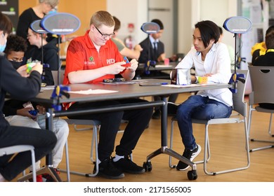 Brisbane, Australia - JUNE 25 2022: Brisbane's 20 In 21 In 2022 Speedcubing Competition, Competitor Solving Pyraminx Event, First Round.