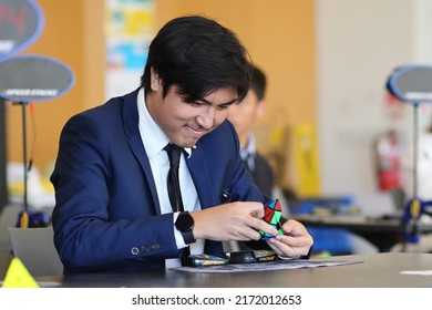 Brisbane, Australia - JUNE 25 2022: Brisbane's 20 In 21 In 2022 Speedcubing Competition, Competitor Solving Pyraminx Event, First Round