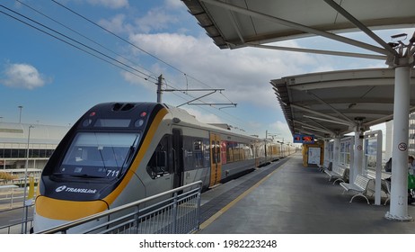 Brisbane, Australia - May 2021: Selective Focus View Of Trainlink Train Stop At The Train Station Platform. Public Transport.