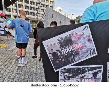 BRISBANE, AUSTRALIA - NOVEMBER 29, 2020: Group Of Protesters Rally To Protest The Dictatorship Of The Thai Prime Minister Prayuth Chan-ocha And Bring Thai Monarchy To Be Under The Constitution