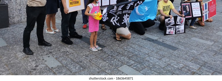 BRISBANE, AUSTRALIA - NOVEMBER 29, 2020: Group Of Protesters Rally To Protest The Dictatorship Of The Thai Prime Minister Prayuth Chan-ocha And Bring Thai Monarchy To Be Under The Constitution