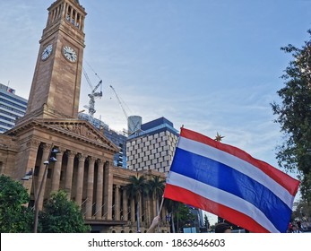 BRISBANE, AUSTRALIA - NOVEMBER 29, 2020: Protesters Shows Thailand Flag To Protest The Dictatorship Of The Prime Minister In Thailand And Also Protest To Bring Thai Monarchy To Be Under Constitution