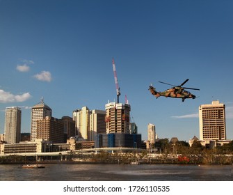 Brisbane, Australia - October 28, 2014. Airforce Helicopter Eurocopter Tiger ARH Serial 4014 Register A38-014 Australian Airforce Flew Above Bisbane CBD In Annual Sun Super River Fire Festival