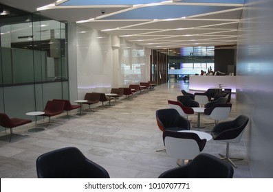 BRISBANE, AUSTRALIA – SEPTEMBER 2 2015: The Virgin Australia Domestic Lounge At Brisbane Airport Welcomes Business Class Passengers With Unidentified Airport Staff In The Background.