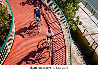 Brisbane, Australia : Unidentified Person Cycling For Exercise In A Path In Southbank Area, Brisbane, Australia (04-2008).