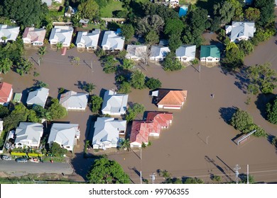 Brisbane Flood JANUARY 2011 Aerial View Of Homes Under Water In Australia's Worst Flooding Disaster. Also Features Paddlers Surveying Damage.