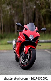 Brisbane QLD Australia 01/15/2020: Bright Red Motorcycle Sitting In A Parking Lot. Very Clean Machine, Fine Detail And Fast Sports Bike.