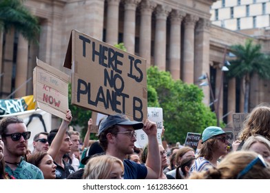 Brisbane, Queensland, Australia - 10th January 2020 : A Man Holds A Sign Protesting Government Inaction During A Rally For Climate Change Action In Response To The Australian Bushfire Crisis