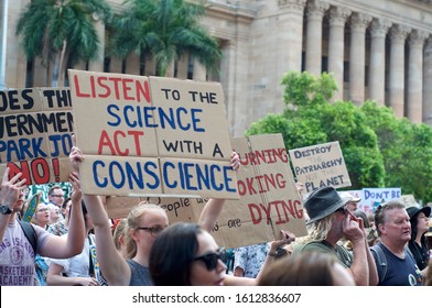 Brisbane, Queensland, Australia - 10th January 2020 : A Woman Holds A Sign Protesting Government Inaction During A Rally For Climate Change Action In Response To The Australian Bushfire Crisis