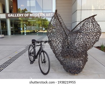 Brisbane, Queensland Australia - April 12 2020: A Road Bicycle  Beside An Art Sculpture Displayed Outside Gallery Of Modern Art