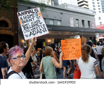 Brisbane, Queensland / Australia - January 24, 2020: Woman Carries Sign Saying 