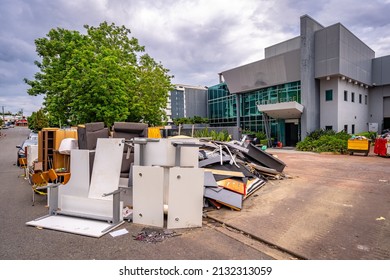 Brisbane, Queensland, Australia - Mar 4, 2022: Flood Damaged Office Furniture Dumped On The Side Of The Road For Collection