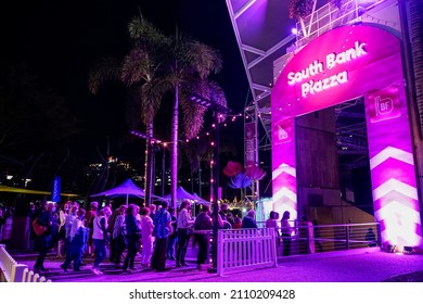 Brisbane, Queensland Australia - September 23 2021: People Lining Up To Enter The South Bank Piazza During A Brisbane Festival Event At Night.