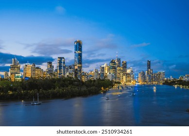 Brisbane skyline by brisbane river at night, capital of Queensland, Australia - Powered by Shutterstock