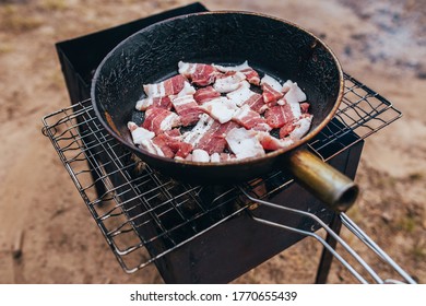 Brisket Bacon Is Fried In A Pan - Fatty Hearty Junk Food - Camping Cuisine