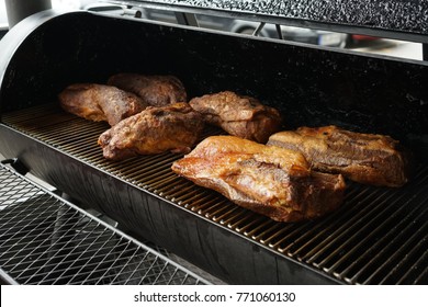 Brisket And Pulled Pork On Smoker.