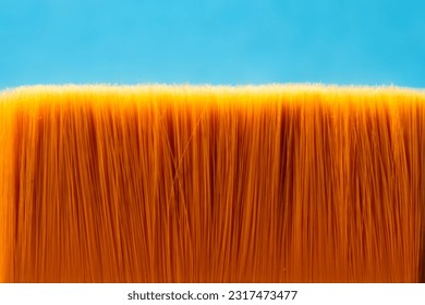 Bristles of paint brush close-up on blue background Abstract modern poster Empty space for your text Creative concept opy space for design Web banner