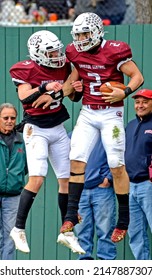 Bristol, CT USA -  November 25, 2021: Bristol Central Quarterback Victor Rosa Celebrates A Touchdown During The Annual Thanksgiving Day Battle Of The Bell. Rosa Is CT Gatorade Player Of The Year.