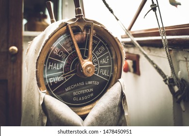 BRISTOL, ENGLAND - JULY 21, 2019: Vintage Brass Ship's Engine Order Speed Control Lever Telegraph Or Chadburn With Copy Space, Bristol, United Kingdom