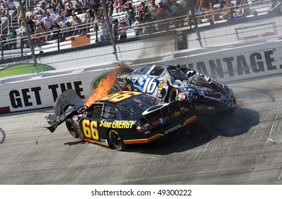 BRISTOL, TN - MAR 20: Steve Wallace And Colin Braun Collide During The Running Of The Scotts Turf Builder 300 Race At The Bristol Motor Speedway On Mar 20, 2010 In Bristol, TN.