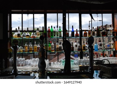 Bristol, UK - 7 29 2010: View Out The Bar Window With Bottles At Mud Dock Cafe